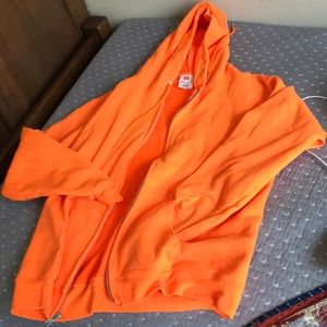 Brand new orange zip up sweatshirt